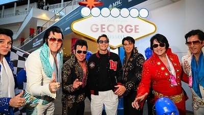 George Russell of Great Britain and Mercedes poses for a photo with a group of Elvis Presley impersonators in the Paddock during previews ahead of the F1 Grand Prix of Las Vegas at Las Vegas Strip Circuit (Getty) George Russell of Great Britain and Mercedes poses for a photo with a group of Elvis Presley impersonators in the Paddock during previews ahead of the F1 Grand Prix of Las Vegas at Las Vegas Strip Circuit (Getty)
