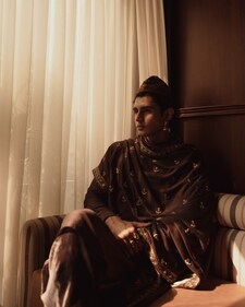 An embellished shawl styled with kurta, pyjama and a Nehru cap. An embellished shawl styled with kurta, pyjama and a Nehru cap.