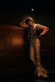 Gota pants with a velvet vest.