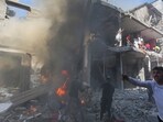 Palestinians look for survivors after an Israeli strike on Rafah, Gaza Strip. (AP) Palestinians look for survivors after an Israeli strike on Rafah, Gaza Strip. (AP)