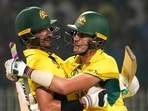 Australia's captain Pat Cummins and Mitchell Starc celebrate after winning the ICC Men's Cricket World Cup 2023 second semi-final match against South Africa. Australia's captain Pat Cummins and Mitchell Starc celebrate after winning the ICC Men's Cricket World Cup 2023 second semi-final match against South Africa.