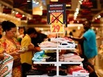 People shop at a store with Black Friday signage in Sao Paulo, Brazil November 16, 2023. 
