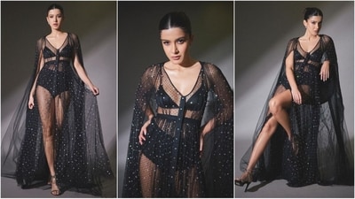 Shanaya Kapoor is a total stunner who can pull off any look to perfection. The stunning Gen Z actress keeps showing her fashion prowess with her back to back fashion forward looks. Shanaya recently attended a lavish party hosted by Sonam Kapoor for David Beckham and her breathtaking look in a sheer gown is swoon worthy. Whether it's a casual mini dress or a chic jumpsuit, Shanaya can turn any outfit into a glamorous affair. And her latest party look in a black dress is no exception and is sure to leave you in awe of her incredible fashion sense. Scroll down to take some style notes from the diva. (Instagram/@shanayakapoor02) Shanaya Kapoor is a total stunner who can pull off any look to perfection. The stunning Gen Z actress keeps showing her fashion prowess with her back to back fashion forward looks. Shanaya recently attended a lavish party hosted by Sonam Kapoor for David Beckham and her breathtaking look in a sheer gown is swoon worthy. Whether it's a casual mini dress or a chic jumpsuit, Shanaya can turn any outfit into a glamorous affair. And her latest party look in a black dress is no exception and is sure to leave you in awe of her incredible fashion sense. Scroll down to take some style notes from the diva. (Instagram/@shanayakapoor02)