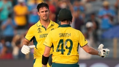 Australia's Mitchell Marsh celebrates his century with Steve Smith during the ICC Men's Cricket World Cup match between Australia and Bangladesh in Pune (AP) Australia's Mitchell Marsh celebrates his century with Steve Smith during the ICC Men's Cricket World Cup match between Australia and Bangladesh in Pune (AP)