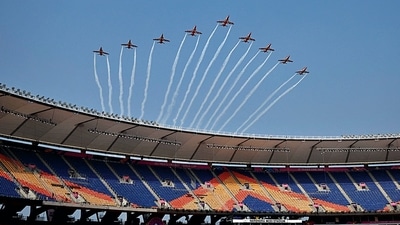 Indian Air Force Surya Kiran aircrafts perform an aerobatic display over the Narendra Modi Stadium in Ahmedabad during a rehearsal ahead of the 2023 ICC Men's Cricket World Cup. (AFP) Indian Air Force Surya Kiran aircrafts perform an aerobatic display over the Narendra Modi Stadium in Ahmedabad during a rehearsal ahead of the 2023 ICC Men's Cricket World Cup. (AFP)