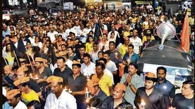 Local Maratha community members participate in a candlelight march in Mumbai to demand reservation. (HT photo/Uday Deolekar) Local Maratha community members participate in a candlelight march in Mumbai to demand reservation. (HT photo/Uday Deolekar)