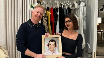 Sarah Hyland who played Haley Dunphy in Modern Family pose with her onscreen uncle Mitchell, played by Jesse Tyler Ferguson. The two are seen posing with a picture of Ty Burrell, who plays Haley's father Phil Dunphy, as he couldn't be a part of the reunion. Sarah Hyland who played Haley Dunphy in Modern Family pose with her onscreen uncle Mitchell, played by Jesse Tyler Ferguson. The two are seen posing with a picture of Ty Burrell, who plays Haley's father Phil Dunphy, as he couldn't be a part of the reunion. 