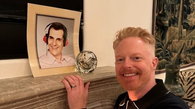 Ty Burrell, who plays the real estate agent Phil Dhunphy in Modern Family, skipped the reunion but his co-stars made sure to include him in the fun and celebrations. Here's his onscreen brother-in-law Mitchell (Jesse Tyler Ferguson) posing with his portrait. Ty Burrell, who plays the real estate agent Phil Dhunphy in Modern Family, skipped the reunion but his co-stars made sure to include him in the fun and celebrations. Here's his onscreen brother-in-law Mitchell (Jesse Tyler Ferguson) posing with his portrait. 