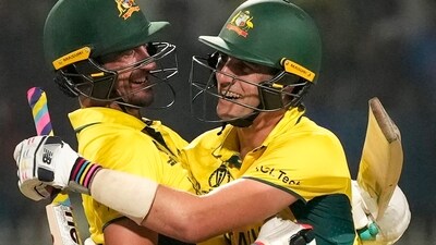Australia's captain Pat Cummins and Mitchell Starc celebrate after winning the ICC Men's Cricket World Cup 2023 second semi-final match against South Africa. (PTI)