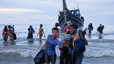 Ethnic Rohingya disembark from their boat upon landing in Ulee Madon, North Aceh, Indonesia, Thursday, Nov. 16, 2023. (AP) Ethnic Rohingya disembark from their boat upon landing in Ulee Madon, North Aceh, Indonesia, Thursday, Nov. 16, 2023. (AP)