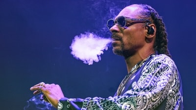 Rapper Snoop Dogg smokes even during concerts. (AP) Rapper Snoop Dogg smokes even during concerts. (AP)