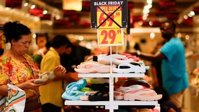 People shop at a store with Black Friday signage in Sao Paulo, Brazil November 16, 2023. (REUTERS)