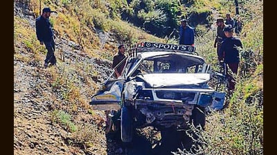 The mangled remains of the cab in Rajouri on Friday. (HT Photo)