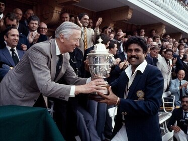 Kapil Dev received the World Cup trophy in 1983. (Getty) Kapil Dev received the World Cup trophy in 1983. (Getty)