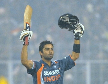 Kohli raises his bat and takes off helmet for the first time in his career (Getty) Kohli raises his bat and takes off helmet for the first time in his career (Getty)