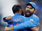 India's captain Rohit Sharma and Mohammad Shami celebrate the team's victory against New Zealand India's captain Rohit Sharma and Mohammad Shami celebrate the team's victory against New Zealand