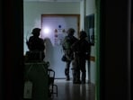 Israeli soldiers inspect the Al Shifa hospital complex in Gaza