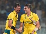 Australia's captain Pat Cummins (R) and Mitchell Starc celebrate Australia's captain Pat Cummins (R) and Mitchell Starc celebrate