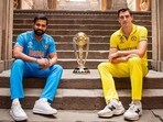 India's captain Rohit Sharma and Australia's captain Pat Cummins pose with the ICC Men's Cricket World Cup 2023 trophy ahead of its final match India's captain Rohit Sharma and Australia's captain Pat Cummins pose with the ICC Men's Cricket World Cup 2023 trophy ahead of its final match