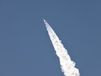 SpaceX's next-generation Starship spacecraft atop its powerful Super Heavy rocket lifts off from the company's Boca Chica launchpad.