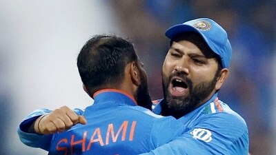 India's captain Rohit Sharma and Mohammad Shami celebrate the team's victory against New Zealand (ICC-X) India's captain Rohit Sharma and Mohammad Shami celebrate the team's victory against New Zealand (ICC-X)
