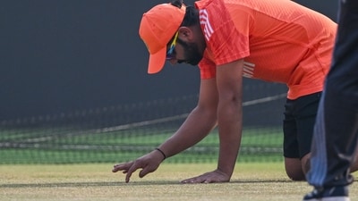 India's captain Rohit Sharma checks the pitch during a practice session at the Narendra Modi Stadium in Ahmedabad (AFP) India's captain Rohit Sharma checks the pitch during a practice session at the Narendra Modi Stadium in Ahmedabad (AFP)