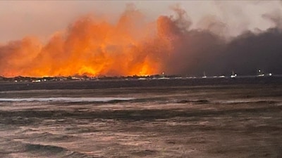 A view of flames as wildfires engulfed the historic town of Lahaina, Maui, Hawaii, U.S. August 9, 2023. Erin Hawk/Handout via REUTERS  THIS IMAGE HAS BEEN SUPPLIED BY A THIRD PARTY. NO RESALES. NO ARCHIVES. (via REUTERS)