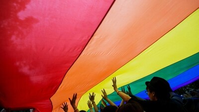 FILE PHOTO: Participants hold a giant rainbow flag during a lesbian, gay, bisexual and transgender (LGBT) Pride Parade in Hong Kong November 8, 2014. (REUTERS)
