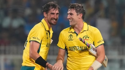 Australia's captain Pat Cummins (R) and Mitchell Starc celebrate (AP) Australia's captain Pat Cummins (R) and Mitchell Starc celebrate (AP)
