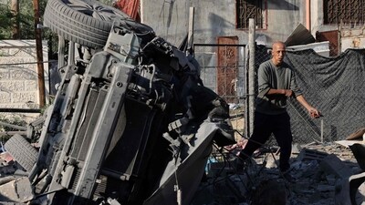 Israel-Hamas War: A Palestinian man inspects the debris of a house following an Israeli strike in Rafah in the southern Gaza Strip. (AFP)
