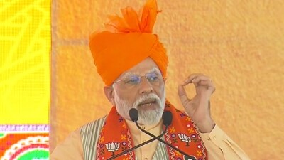 Prime Minister Narendra Modi speaks during a public meeting ahead of Rajasthan Assembly elections, in Bharatpur, (PTI)