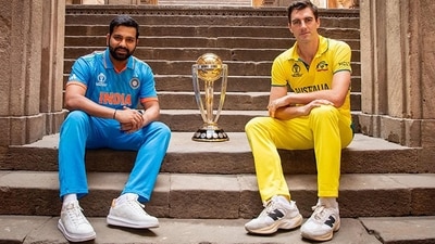 India's captain Rohit Sharma and Australia's captain Pat Cummins pose with the ICC Men's Cricket World Cup 2023 trophy ahead of its final match (PTI) India's captain Rohit Sharma and Australia's captain Pat Cummins pose with the ICC Men's Cricket World Cup 2023 trophy ahead of its final match (PTI)