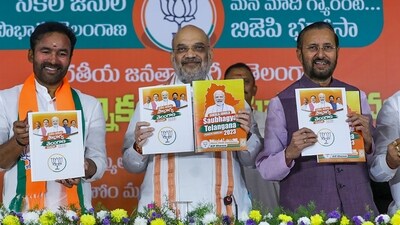 Union Home Minister Amit Shah with Union Minister and Telangana BJP President G. Kishan Reddy and party leader Prakash Javadekar releases the party's manifesto for the Telangana Assembly elections. (PTI) Union Home Minister Amit Shah with Union Minister and Telangana BJP President G. Kishan Reddy and party leader Prakash Javadekar releases the party's manifesto for the Telangana Assembly elections. (PTI)