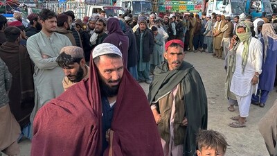 Afghans wait for clearance to depart for their homeland at a deportation camp set up by authorities to facilitate illegal immigrants, (AP)