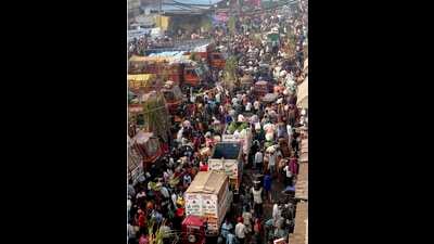 People shop for the 'Chhath Puja' celebrations at Azadpur Mandi in New Delhi on Saturday (PTI) People shop for the 'Chhath Puja' celebrations at Azadpur Mandi in New Delhi on Saturday (PTI)