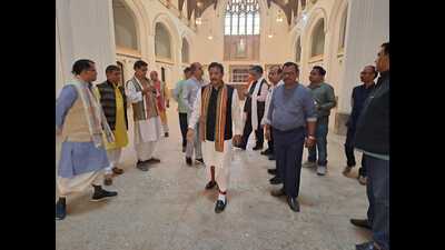 Prof Bihari Lal Sharma inspecting the ancient building for the convocation (HT Photo)