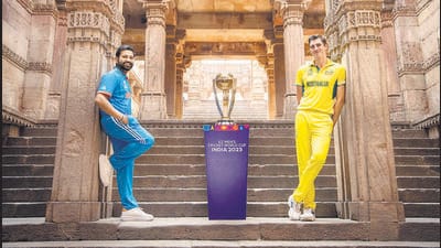 Skippers Rohit Sharma and Pat Cummins pose with the World Cup trophy on Saturday, ahead of the final on Sunday. (PTI) Skippers Rohit Sharma and Pat Cummins pose with the World Cup trophy on Saturday, ahead of the final on Sunday. (PTI)