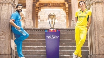 Skippers Rohit Sharma and Pat Cummins pose with the World Cup trophy on Saturday, ahead of the final on Sunday (HT) Skippers Rohit Sharma and Pat Cummins pose with the World Cup trophy on Saturday, ahead of the final on Sunday (HT)