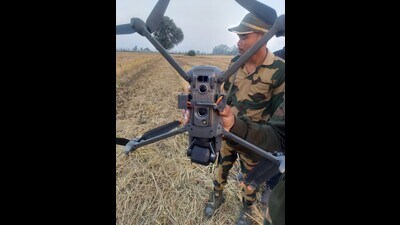 The drone, the officials said, appeared to have entered the Indian airspace while smuggling contraband and was recovered at around 4:40 pm in a farming field in the border village.