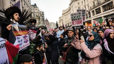 Protesters from Orthodox Jews Against Zionism, left, attend a pro-Palestinian demonstration in central London, UK, on Saturday, Oct. 14, 2023. Israel said it�s preparing for �the next stages of the war� against Hamas that would include �an integrated and coordinated attack from the air, sea and land� on the Gaza Strip. Photographer: Jose Sarmento Matos/Bloomberg (Bloomberg) Protesters from Orthodox Jews Against Zionism, left, attend a pro-Palestinian demonstration in central London, UK, on Saturday, Oct. 14, 2023. Israel said it�s preparing for �the next stages of the war� against Hamas that would include �an integrated and coordinated attack from the air, sea and land� on the Gaza Strip. Photographer: Jose Sarmento Matos/Bloomberg (Bloomberg)