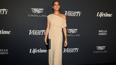 Meghan Markle, Duchess of Sussex made a rare red carpet appearance at Variety's Power of Women event in Los Angeles. She wore a beige gown with multiple slits and talked about how much she loves her kids enjoying during their vacations.&nbsp; (REUTERS)