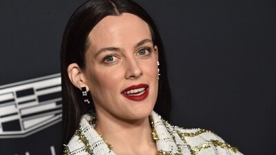 Riley Keough arrives for Variety's Power of Women event in a white and golden check dress. She was seen in the musical TV series Daisy Jones & the Six this year and is nominated for the Emmys in the Outstanding Lead Actress In A Limited Or Anthology Series Or Movie category. (AFP) Riley Keough arrives for Variety's Power of Women event in a white and golden check dress. She was seen in the musical TV series Daisy Jones & the Six this year and is nominated for the Emmys in the Outstanding Lead Actress In A Limited Or Anthology Series Or Movie category. (AFP)