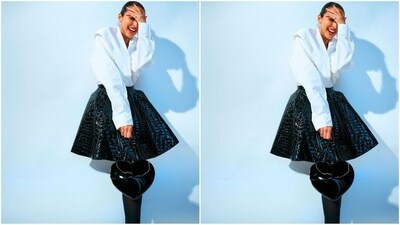 Assisted by celebrity fashion stylist Maneka Harisinghani, Malaika styled her look with a heart-shaped shiny black sling bag, diamond statement earrings and multiple rings adorning her fingers. (Instagram/@malaikaaroraofficial) Assisted by celebrity fashion stylist Maneka Harisinghani, Malaika styled her look with a heart-shaped shiny black sling bag, diamond statement earrings and multiple rings adorning her fingers. (Instagram/@malaikaaroraofficial)
