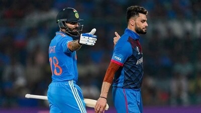 Virat Kohli and Naveen ul Haq during India and Afghanistan encounter in ICC World Cup. (Twitter) Virat Kohli and Naveen ul Haq during India and Afghanistan encounter in ICC World Cup. (Twitter)