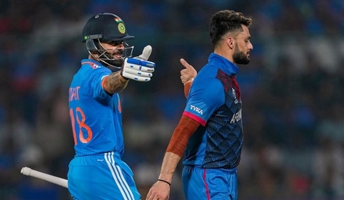 Kohli and Naveen let bygones by bygones (AFP)
