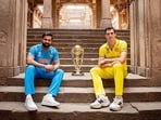 India Captain Rohit Sharma and Australia Captain Pat Cummins pose for a picture with the trophy ahead of their ICC Men's Cricket World Cup 2023 final match, at Adalaj Stepwell in Adalaj on Saturday.