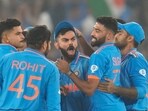 Virat Kohli celebrates the wicket of David Warner with teammates during the ICC Men's Cricket World Cup final match between India and Australia in Ahmedabad Virat Kohli celebrates the wicket of David Warner with teammates during the ICC Men's Cricket World Cup final match between India and Australia in Ahmedabad