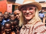 Actress Patricia Arquette with children in Kampala, Uganda	