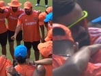 Rohit Sharma and Virat Kohli during the team huddle. Rohit Sharma and Virat Kohli during the team huddle.