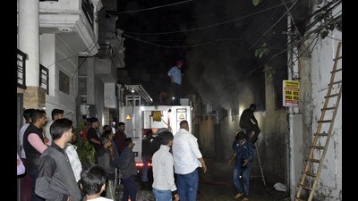 A fire tender dousing fire at a hosiery unit in Ludhiana. (HT Photo)